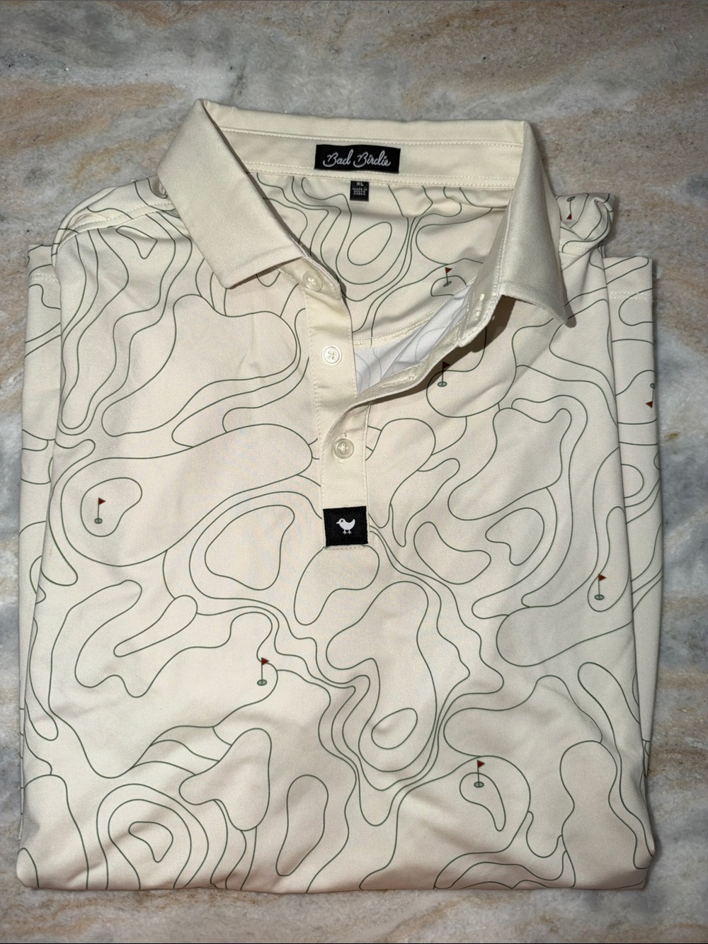 Bad Birdie Cream Polo with Subtle Topographic Line Print size XL